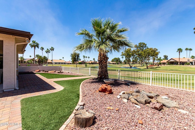 10826 E Navajo Dr, Sun Lakes, AZ 85248 - view of yard with a residential view, a patio, golf course view, and a fenced backyard