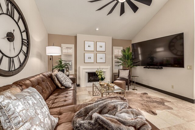 10826 E Navajo Dr, Sun Lakes, AZ 85248 - living room with a fireplace, ceiling fan, high vaulted ceiling, and baseboards