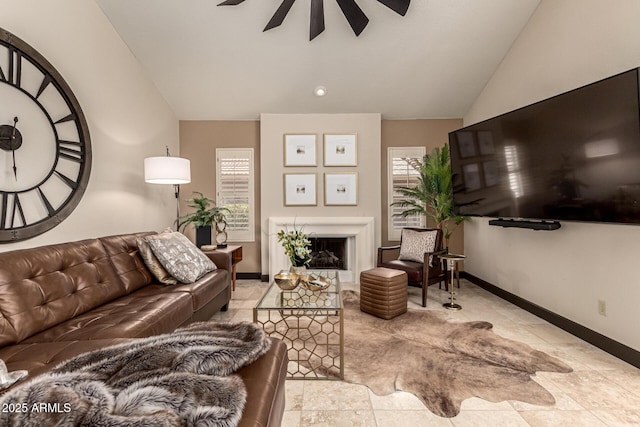 10826 E Navajo Dr, Sun Lakes, AZ 85248 - living room with baseboards, ceiling fan, plenty of natural light, and vaulted ceiling