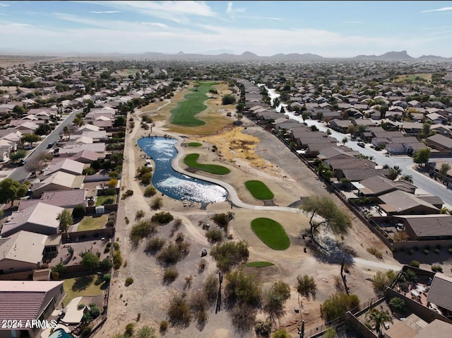 birds eye view of property featuring a mountain view