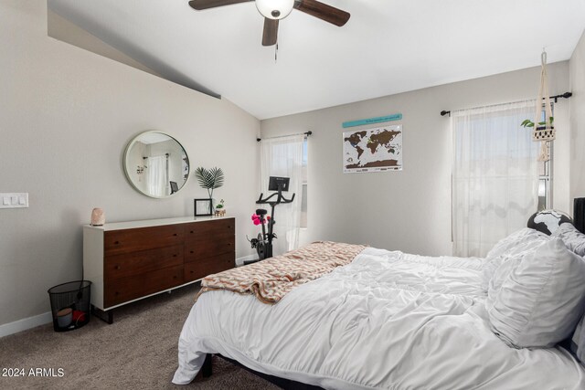 bedroom featuring lofted ceiling, ceiling fan, and carpet floors