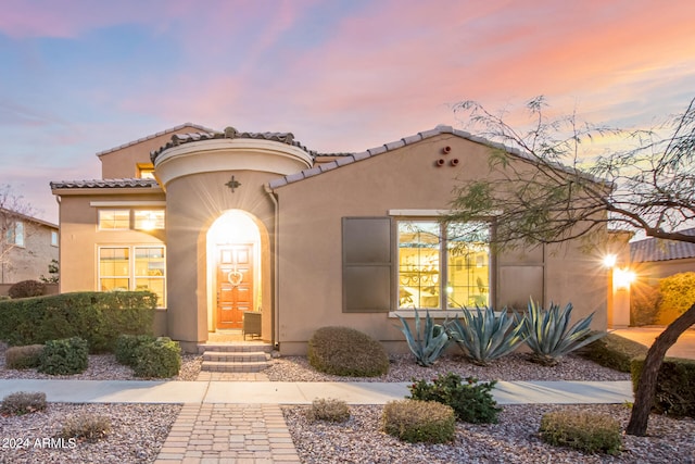 mediterranean / spanish home with central air condition unit