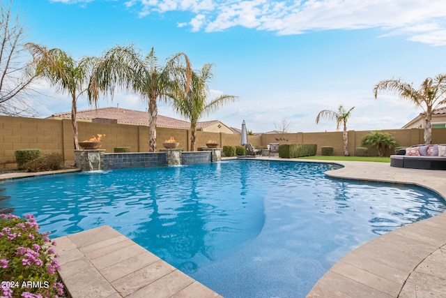 view of pool with pool water feature