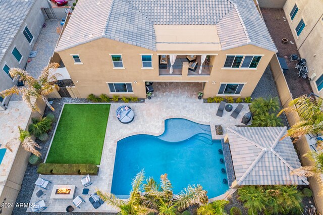 view of pool featuring a patio