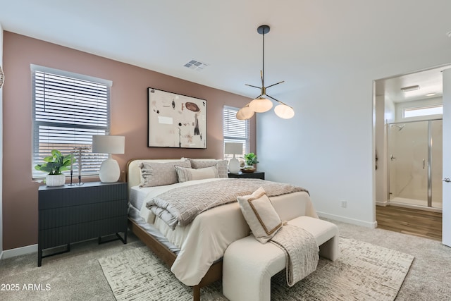 3129 S 155th Ln, Goodyear, AZ 85338 - bedroom with light carpet and ensuite bathroom