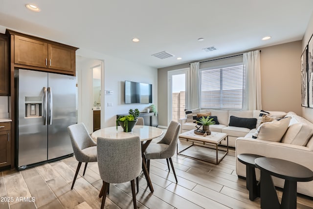 3129 S 155th Ln, Goodyear, AZ 85338 - dining area featuring wood tiled floors and recessed lighting