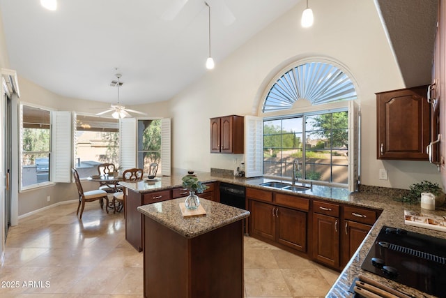 19275 N 88th Way, Scottsdale, AZ 85255 - kitchen featuring ceiling fan, healthy amount of natural light, stone countertops, black appliances, and high vaulted ceiling