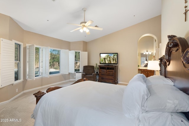 19275 N 88th Way, Scottsdale, AZ 85255 - carpeted bedroom with lofted ceiling, ensuite bathroom, a ceiling fan, and arched walkways