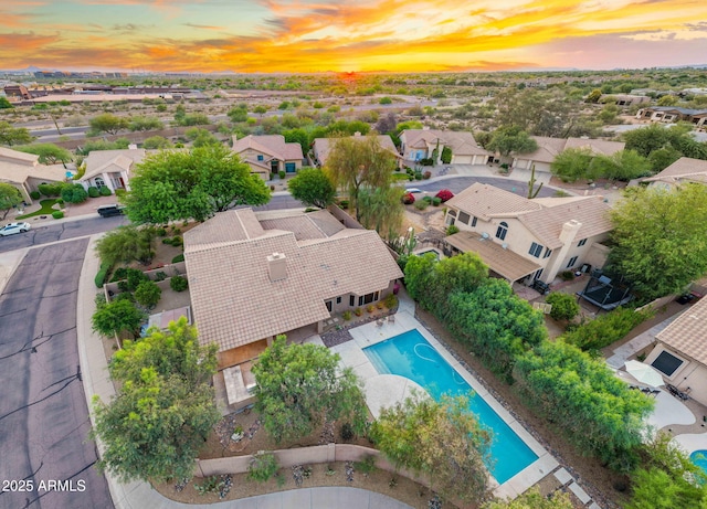 19275 N 88th Way, Scottsdale, AZ 85255 - aerial view at dusk of a residential view and view of pool area