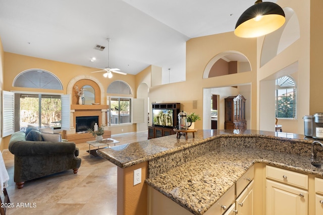 19275 N 88th Way, Scottsdale, AZ 85255 - kitchen featuring high vaulted ceiling, a ceiling fan, open floor plan, and plenty of natural light
