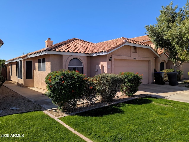 mediterranean / spanish-style home featuring a garage, stucco siding, a chimney, and a tile roof