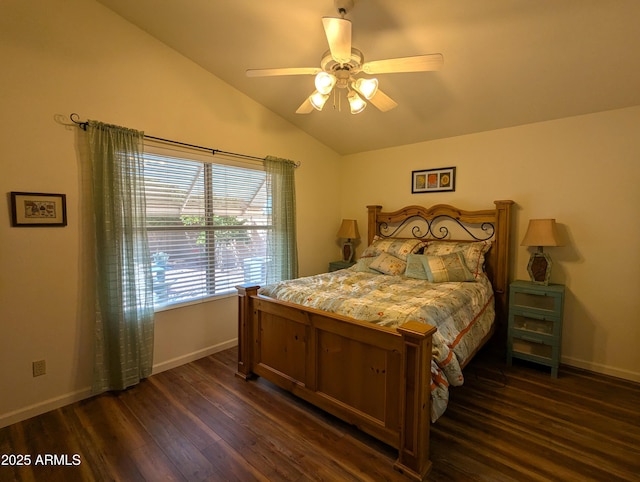 bedroom featuring baseboards, lofted ceiling, ceiling fan, and dark wood-style flooring