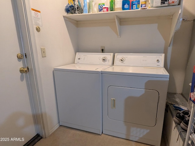 laundry area featuring laundry area and washing machine and clothes dryer