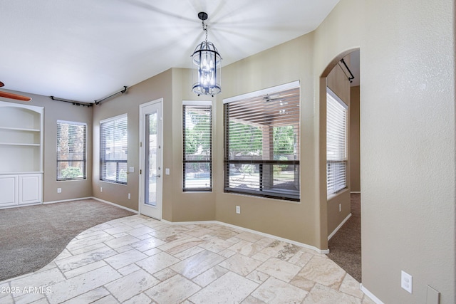 1470 W Bartlett Way, Chandler, AZ 85248 - entrance foyer with arched walkways, stone tile flooring, baseboards, and ceiling fan