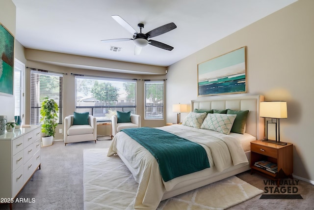 1470 W Bartlett Way, Chandler, AZ 85248 - bedroom featuring light colored carpet, multiple windows, baseboards, and ceiling fan