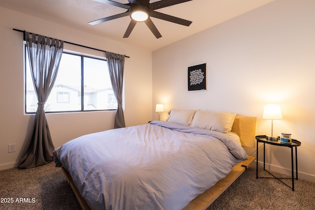 carpeted bedroom featuring a ceiling fan and baseboards