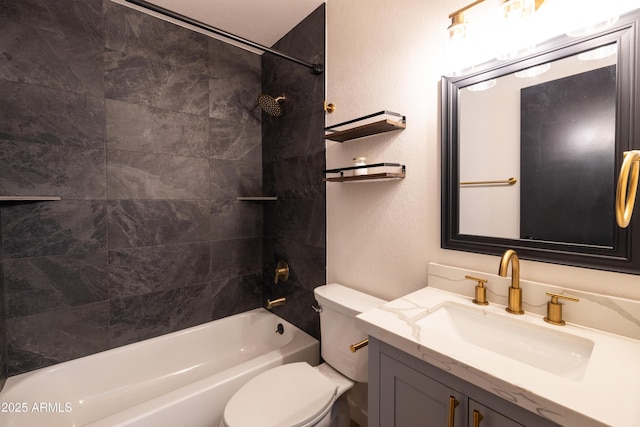 bathroom featuring toilet, vanity, and shower / bathing tub combination