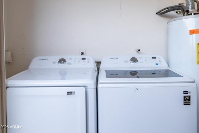 laundry room featuring laundry area and washing machine and clothes dryer