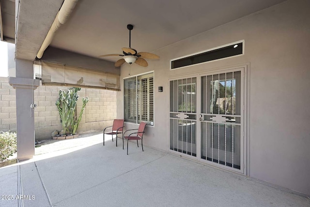 view of patio / terrace with ceiling fan