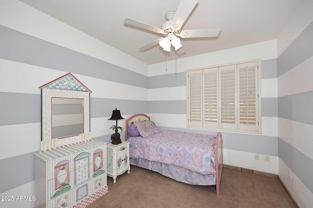 carpeted bedroom with a ceiling fan