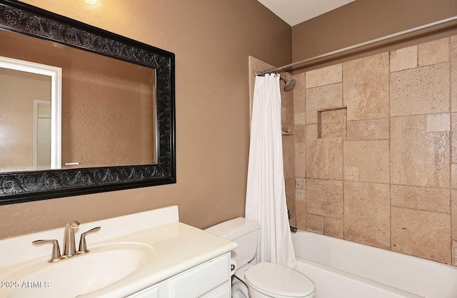 full bathroom featuring toilet, vanity, and shower / bath combination with curtain