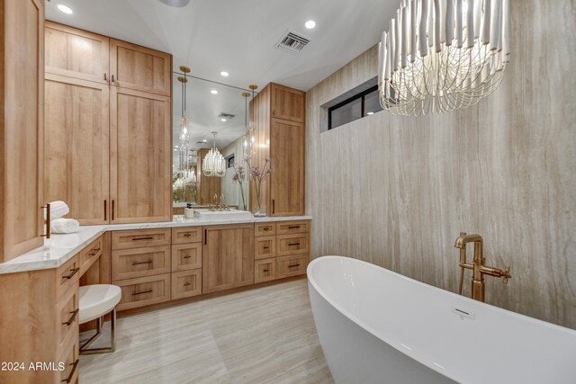 bathroom with vanity and shower with separate bathtub