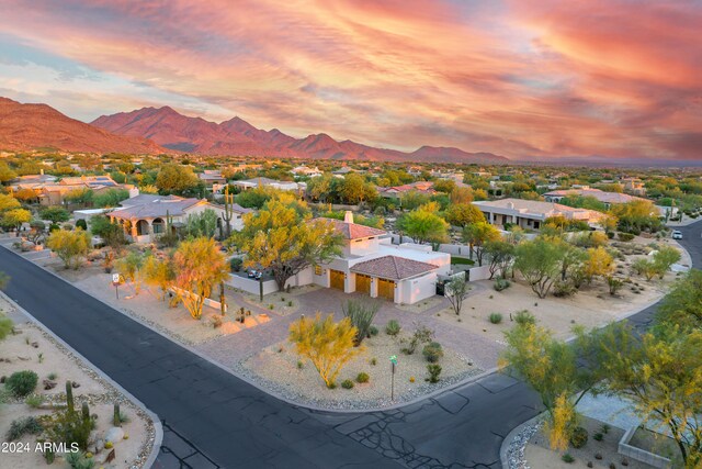 aerial view at dusk with a mountain view