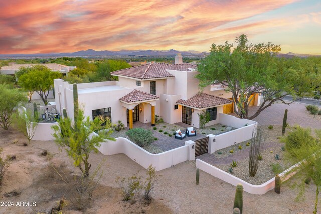 mediterranean / spanish house with a mountain view