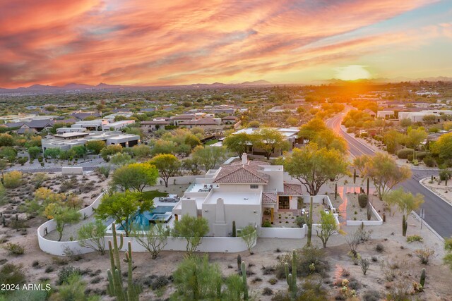 aerial view at dusk with a mountain view