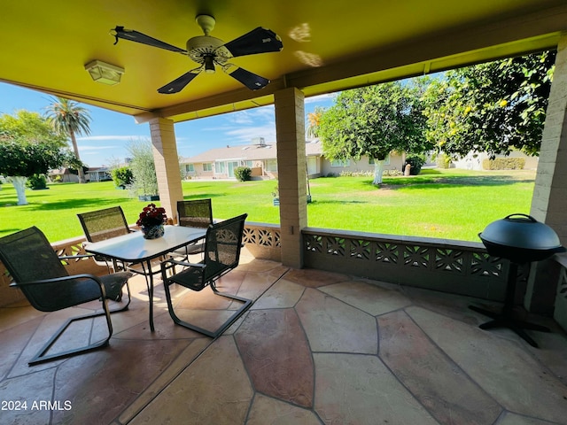 view of patio / terrace featuring area for grilling and ceiling fan