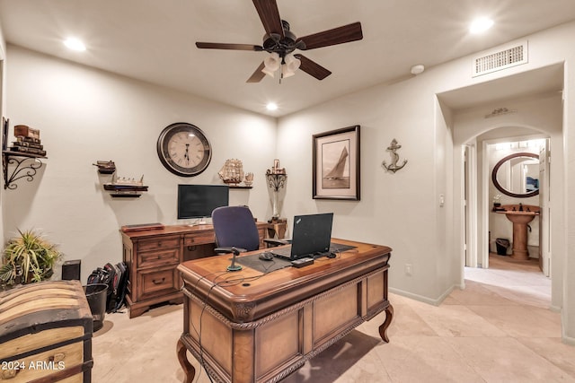 office featuring sink and ceiling fan