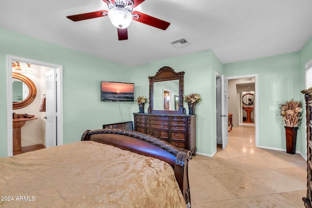 tiled bedroom with ceiling fan