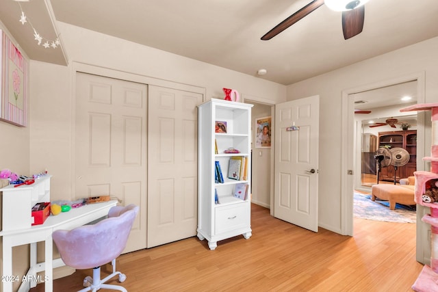 office area featuring light hardwood / wood-style floors and ceiling fan