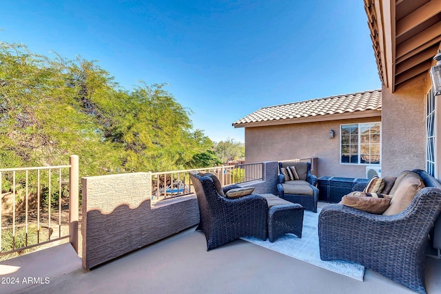 view of patio / terrace featuring a balcony and an outdoor hangout area