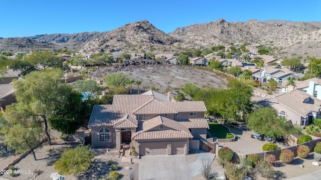 drone / aerial view featuring a mountain view