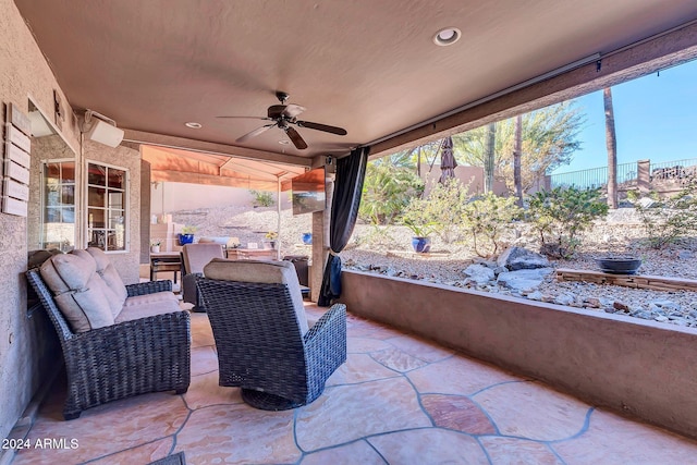 view of patio featuring outdoor lounge area and ceiling fan