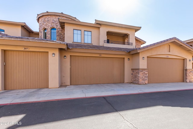 view of front of property with a garage