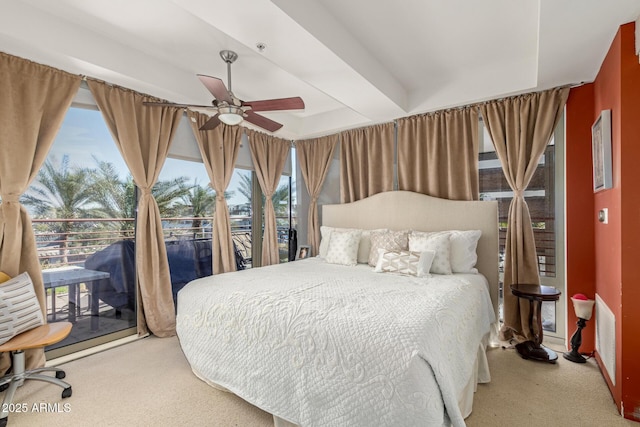bedroom with carpet, access to exterior, and a ceiling fan