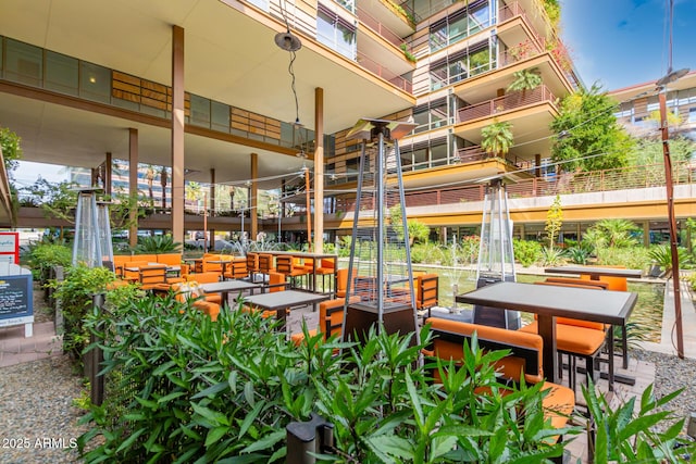 view of home's community with outdoor lounge area
