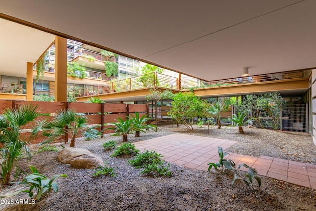 view of patio / terrace featuring fence