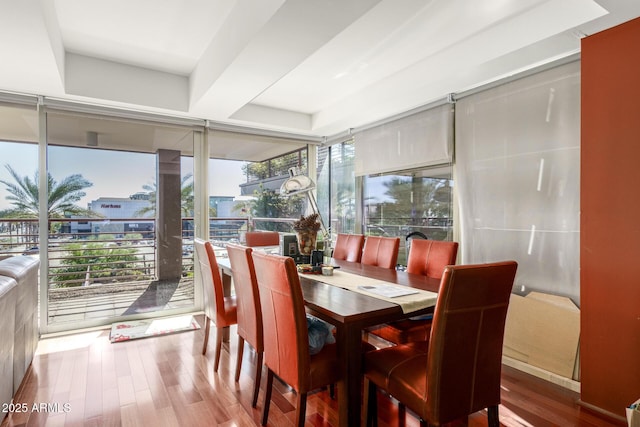 dining room with wood finished floors