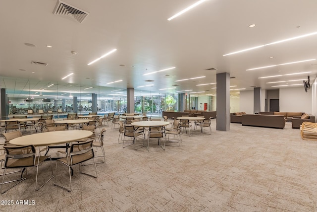 view of carpeted dining area