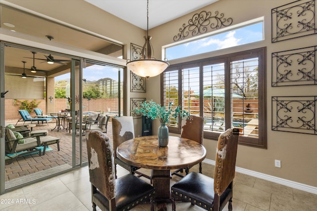 dining space with ceiling fan