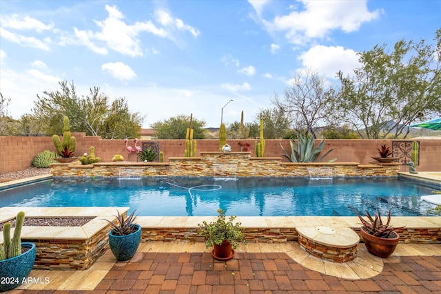 view of pool featuring pool water feature