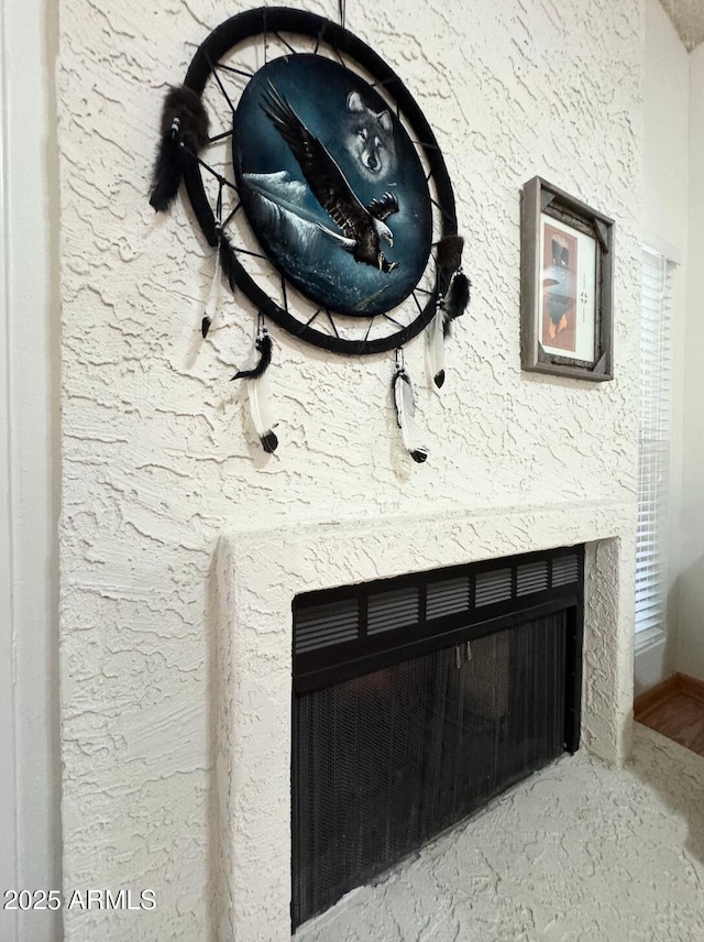 details featuring a premium fireplace