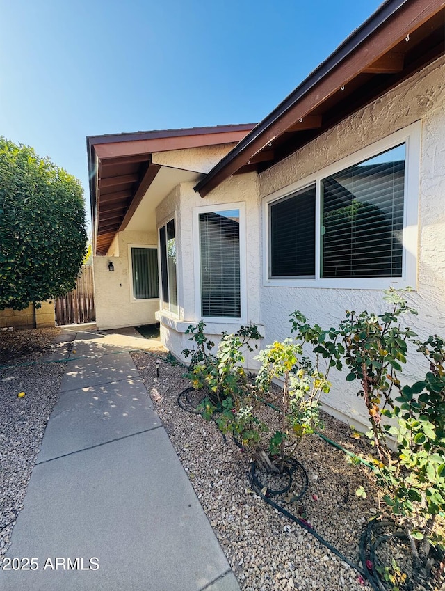 view of home's exterior with a patio