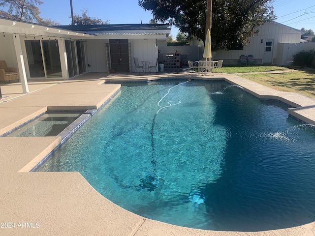 view of pool with a patio area