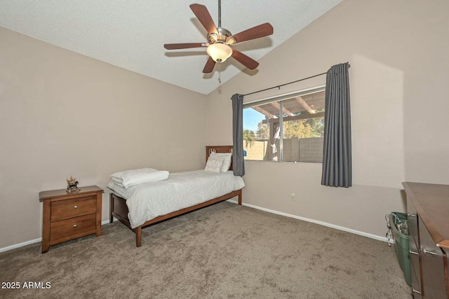 bedroom featuring ceiling fan, carpet flooring, and vaulted ceiling