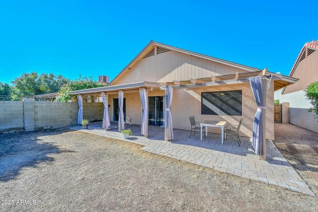 back of house featuring a patio area