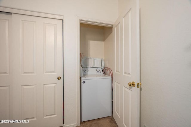 laundry room featuring washer / dryer